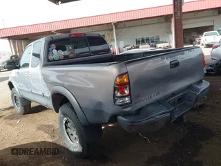 2000 Toyota Tundra SR5 with VIN 5TBRN3415YS049029, listed as a IAAI auction lot 41731441 with 202,100 mi miles and . Bid and sale history available at DreamBid. Image 3.