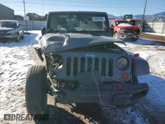 2013 Jeep Wrangler Rubicon с VIN 1C4BJWCG4DL700853, выставлен на аукционе Copart как лот 42822285 с пробегом 126 433 миль миль и Списание • Salvage title. История ставок и продаж доступна на DreamBid. Изображение 5.