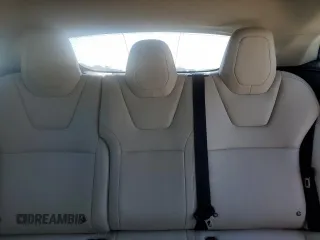 2019 Tesla Model S 100D with VIN 5YJSA1E42KF331240, listed as a Copart auction lot 54713975 with 43,940 mi miles and Salvage title. Bid and sale history available at DreamBid. Image 10.