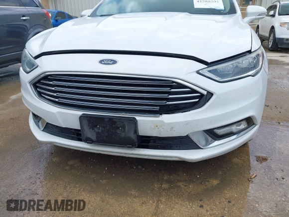 2017 Ford Fusion Titanium с VIN 3FA6P0K9XHR146909, выставлен на аукционе IAAI как лот 42588301 с пробегом 217 885 миль миль и . История ставок и продаж доступна на DreamBid. Изображение 6.