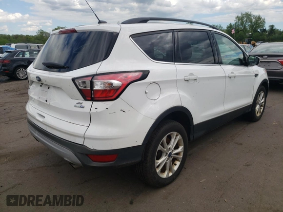 2018 Ford Escape SE z VIN 1FMCU9GDXJUA71940, wystawiony jako Copart lot #55891775 z przebiegiem 117 298 mil mil oraz Tytuł czysty. Historia ofert i sprzedaży dostępna na DreamBid. Obrazek 3.