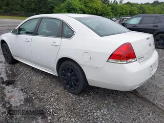 2014 Chevrolet Impala Police Police z VIN 2G1WD5E31E1172055, wystawiony jako IAAI lot #42371421 z przebiegiem 94 079 mil mil oraz . Historia ofert i sprzedaży dostępna na DreamBid. Obrazek 3.
