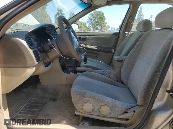 2000 Nissan Altima XE z VIN 1N4DL01D5YC243801, wystawiony jako Copart lot #52642985 z przebiegiem 237 665 mil mil oraz Szkoda całkowita • Salvage title. Historia ofert i sprzedaży dostępna na DreamBid. Obrazek 7.