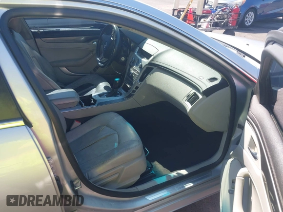 2009 Cadillac CTS RWD z VIN 1G6DU57VX90143820, wystawiony jako IAAI lot #42450086 z przebiegiem 170 656 mil mil oraz . Historia ofert i sprzedaży dostępna na DreamBid. Obrazek 5.
