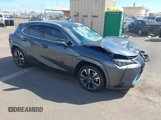 2022 Lexus UX with VIN JTHL3JBH0N2046676, listed as a IAAI auction lot 41451109 with 28,681 mi miles and . Bid and sale history available at DreamBid. Image 1.