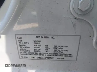 2023 Tesla Model Y Long Range with VIN 7SAYGAEE3PF753657, listed as a IAAI auction lot 41668917 with 33,301 mi miles and . Bid and sale history available at DreamBid. Image 9.