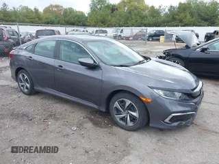 2020 Honda Civic LX with VIN 2HGFC2F62LH506052, listed as a IAAI auction lot 42220319 with 44,348 mi miles and . Bid and sale history available at DreamBid. Image 1.