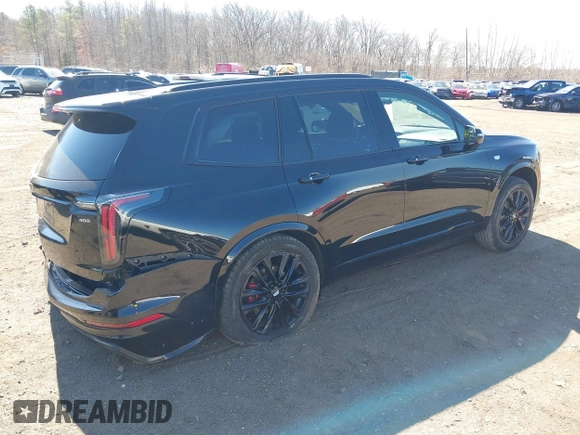 2022 Cadillac XT6 Sport with VIN 1GYKPGRS3NZ143717, listed as a IAAI auction lot 41758715 with 49,083 mi miles. Bid and sale history available at carsss.com. Image 4.