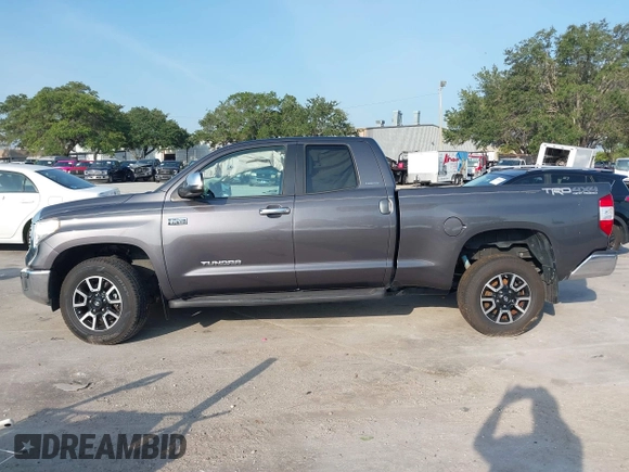2017 Toyota Tundra Limited z VIN 5TFBW5F17HX612817, wystawiony jako IAAI lot #36970939 z przebiegiem 164 634 mil mil oraz . Historia ofert i sprzedaży dostępna na DreamBid. Obrazek 14.