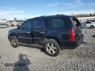 2013 Chevrolet Tahoe LTZ with VIN 1GNSCCE04DR162474, listed as a Copart auction lot 49386335 with 331,358 mi miles and Salvage title. Bid and sale history available at DreamBid. Image 2.