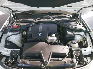 2016 BMW 3 Series 328i with VIN WBA8E9G58GNT47869, listed as a IAAI auction lot 41594120 with 57,561 mi miles. Bid and sale history available at carsss.com. Image 10.