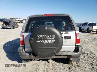 2002 Isuzu Rodeo z VIN 4S2CK57W524323426, wystawiony jako Copart lot #42191765 z przebiegiem 112 024 mil mil oraz Szkoda całkowita • Salvage title. Historia ofert i sprzedaży dostępna na DreamBid. Obrazek 6.