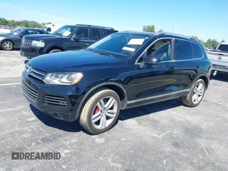 2013 Volkswagen Touareg Lux with VIN WVGEF9BP6DD004454, listed as a IAAI auction lot 41862958 with 239,548 mi miles and . Bid and sale history available at DreamBid. Image 17.