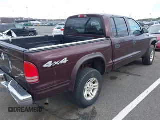 2004 Dodge Dakota SLT with VIN 1D7HG48NX4S751497, listed as a IAAI auction lot 41737935 with 106,064 mi miles. Bid and sale history available at carsss.com. Image 4.