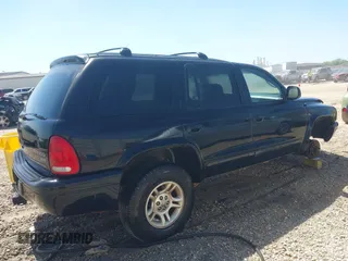 2003 Dodge Durango SLT z VIN 1D4HS48N13F605959, wystawiony jako IAAI lot #41970393 z przebiegiem Nie podano mil oraz . Historia ofert i sprzedaży dostępna na DreamBid. Obrazek 4.