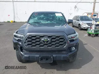 2020 Toyota Tacoma SR5 with VIN 3TMCZ5AN7LM321061, listed as a IAAI auction lot 41985533 with 32,111 mi miles and . Bid and sale history available at DreamBid. Image 13.