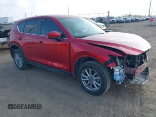 2023 Mazda CX-5 S Carbon Edition z VIN JM3KFBCMXP0192739, wystawiony jako IAAI lot #41527910 z przebiegiem 35 845 mil mil oraz . Historia ofert i sprzedaży dostępna na DreamBid. Obrazek 1.