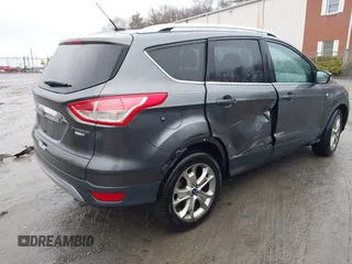 2015 Ford Escape Titanium with VIN 1FMCU9JX6FUB79093, listed as a IAAI auction lot 41805057 with 87,788 mi miles. Bid and sale history available at carsss.com. Image 4.