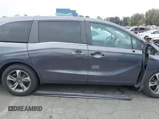 2018 Honda Odyssey Touring with VIN 5FNRL6H88JB062213, listed as a IAAI auction lot 42489379 with 90,578 mi miles and . Bid and sale history available at DreamBid. Image 14.