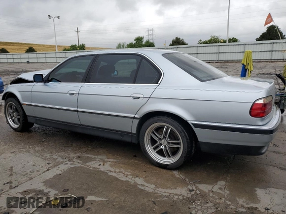 1997 BMW 7 Series 740il with VIN WBAGJ8323VDM00753, listed as a Copart auction lot 66674414 with 255,389 mi miles and Salvage Title. Bid and sale history available at carsss.com. Image 2.
