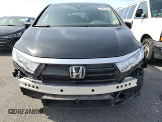 2021 Honda Odyssey Touring with VIN 5FNRL6H89MB008147, listed as a Copart auction lot 49830205 with 58,632 mi miles and Clean Title. Bid and sale history available at carsss.com. Image 5.