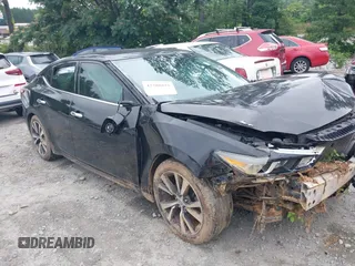 2016 Nissan Maxima Platinum with VIN 1N4AA6AP0GC416323, listed as a IAAI auction lot 42388851 with 148,851 mi miles and . Bid and sale history available at DreamBid. Image 1.