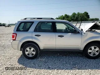 2011 Ford Escape XLS с VIN 1FMCU0C70BKB97667, выставлен на аукционе Copart как лот 52709365 с пробегом 140 582 миль миль и Списание • Salvage title. История ставок и продаж доступна на DreamBid. Изображение 11.