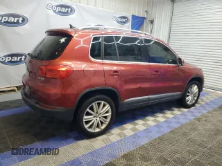 2012 Volkswagen Tiguan SE z VIN WVGAV7AX9CW002143, wystawiony jako Copart lot #55820395 z przebiegiem 174 356 mil mil oraz Czysty tytuł • Clean title. Historia ofert i sprzedaży dostępna na DreamBid. Obrazek 3.