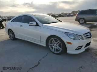 2011 Mercedes-Benz E-Class E 550 with VIN WDDKJ7CBXBF077136, listed as a Copart auction lot 83542054 with 125,274 mi miles and Salvage Title. Bid and sale history available at carsss.com. Image 4.