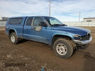 2004 Dodge Dakota SLT with VIN 1D7HG42N74S687010, listed as a Copart auction lot 46984265 with 249,297 mi miles and Salvage Title. Bid and sale history available at carsss.com. Image 4.