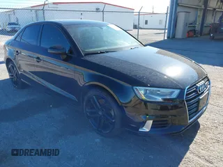 2017 Audi A3 Sedan Premium with VIN WAUAUGFF5H1067144, listed as a IAAI auction lot 40989617 with 92,218 mi miles. Bid and sale history available at carsss.com. Image 1.
