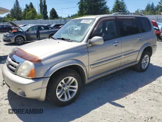 2005 Suzuki XL7 LX with VIN JS3TX92VX54103160, listed as a Copart auction lot 63430535 with 144,956 mi miles and Salvage title. Bid and sale history available at DreamBid. Image 1.