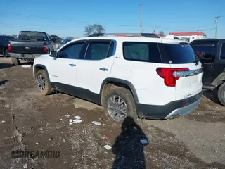 2020 GMC Acadia SLT with VIN 1GKKNMLS4LZ136098, listed as a IAAI auction lot 41618272 with 100,486 mi miles and . Bid and sale history available at DreamBid. Image 3.