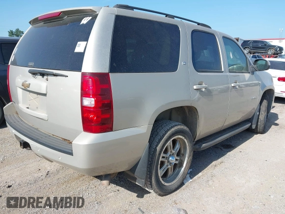 2007 Chevrolet Tahoe LT z VIN 1GNFK13007J146559, wystawiony jako IAAI lot #42686539 z przebiegiem 278 300 mil mil oraz . Historia ofert i sprzedaży dostępna na DreamBid. Obrazek 4.