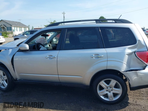 2009 Subaru Forester X with VIN JF2SH63699H720644, listed as a IAAI auction lot 42163727 with 141,503 mi miles and . Bid and sale history available at DreamBid. Image 15.
