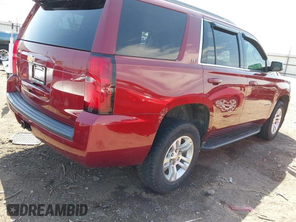 2018 Chevrolet Tahoe LT with VIN 1GNSKBKC6JR215585, listed as a IAAI auction lot 42043898 with 85,730 mi miles and . Bid and sale history available at DreamBid. Image 4.