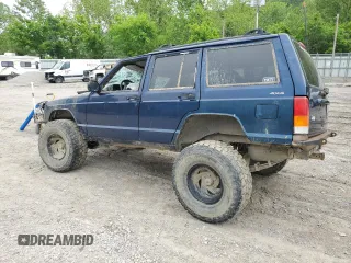 2001 Jeep Cherokee Sport with VIN 1J4FF48S21L595966, listed as a Copart auction lot 55946575 with Not provided miles and Salvage title. Bid and sale history available at DreamBid. Image 2.