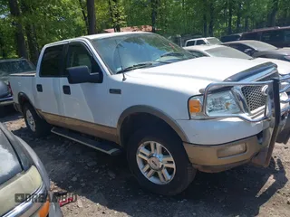 2004 Ford F-150 XLT with VIN 1FTPW12504KC34452, listed as a IAAI auction lot 42051599 with 215,857 mi miles. Bid and sale history available at carsss.com. Image 1.