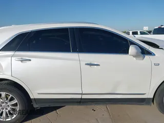 2018 Cadillac XT5 Luxury FWD z VIN 1GYKNCRS3JZ143354, wystawiony jako IAAI lot #41973536 z przebiegiem 101 327 mil mil oraz . Historia ofert i sprzedaży dostępna na DreamBid. Obrazek 13.