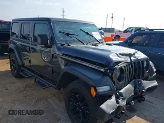 2022 Jeep Wrangler Unlimited Sport S with VIN 1C4HJXDG5NW105931, listed as a IAAI auction lot 42349628 with 37,314 mi miles and . Bid and sale history available at DreamBid. Image 1.