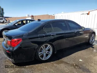 2015 BMW 7 Series 750Li with VIN WBAYE8C54FD780710, listed as a Copart auction lot 50499865 with 101,539 mi miles and Clean Title. Bid and sale history available at carsss.com. Image 3.
