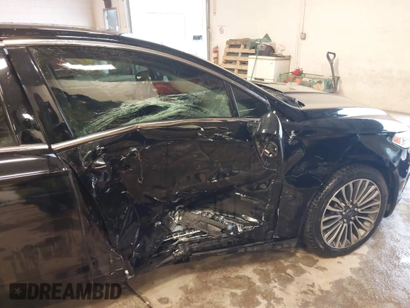 2017 Ford Fusion Titanium с VIN 3FA6P0SU8HR215570, выставлен на аукционе IAAI как лот 41427407 с пробегом 97 281 миль миль и . История ставок и продаж доступна на DreamBid. Изображение 6.