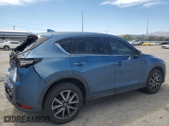 2018 Mazda CX-5 Grand Touring with VIN JM3KFBDM3J0323211, listed as a Copart auction lot 61166735 with Not provided miles and Salvage title. Bid and sale history available at DreamBid. Image 3.