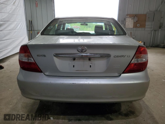 2003 Toyota Camry LE with VIN 4T1BE32K33U710903, listed as a Copart auction lot 56976585 with 157,444 mi miles and Clean Title. Bid and sale history available at DreamBid. Image 6.