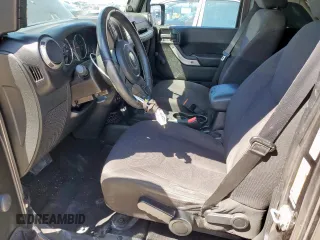 2014 Jeep Wrangler Unlimited Sport with VIN 1C4BJWDG2EL294829, listed as a Copart auction lot 51921685 with 138,203 mi miles and Salvage Title. Bid and sale history available at DreamBid. Image 7.