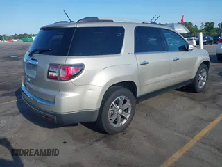 2014 GMC Acadia SLT z VIN 1GKKRSKDXEJ300483, wystawiony jako IAAI lot #42333981 z przebiegiem 167 155 mil mil oraz . Historia ofert i sprzedaży dostępna na DreamBid. Obrazek 4.