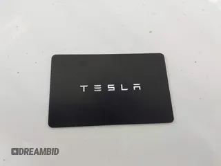 2025 Tesla Model 3 Long Range with VIN 5YJ3E1EA1SF923548, listed as a IAAI auction lot 42046257 with 3,979 mi miles and . Bid and sale history available at carsss.com. Image 11.