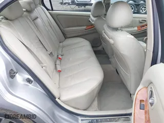 2002 Infiniti I35 Luxury with VIN JNKDA31A22T005398, listed as a IAAI auction lot 41818757 with 165,228 mi miles. Bid and sale history available at carsss.com. Image 8.
