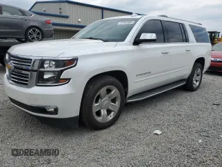 2016 Chevrolet Suburban LTZ with VIN 1GNSKJKC9GR310192, listed as a Copart auction lot 57997065 with 122,878 mi miles and Salvage title. Bid and sale history available at DreamBid. Image 1.
