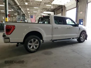 2021 Ford F-150 XL with VIN 1FTFW1E88MKE41611, listed as a Copart auction lot 61092115 with 83,277 mi miles and Salvage title. Bid and sale history available at DreamBid. Image 3.
